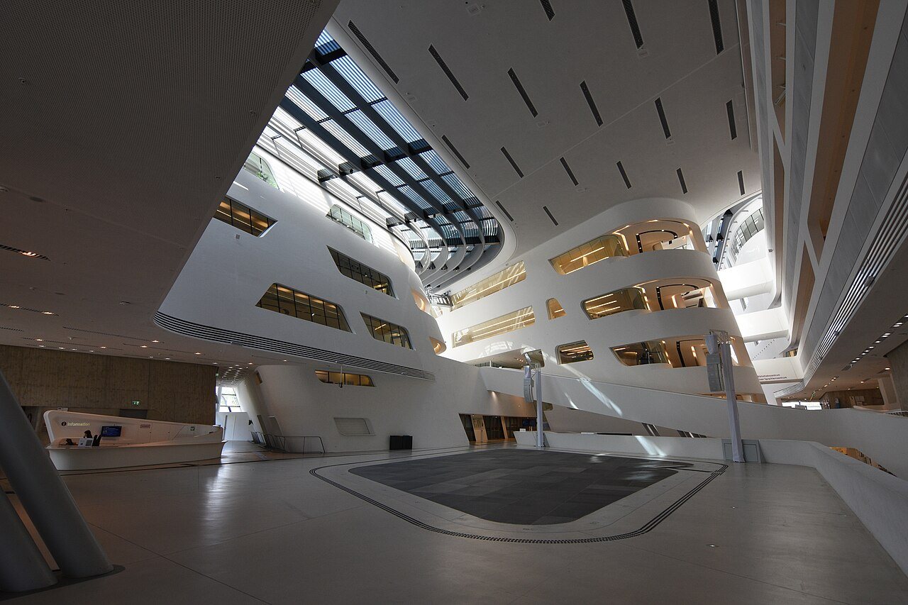 Interior atrium and study spaces inside the WU Vienna Library and Learning Center